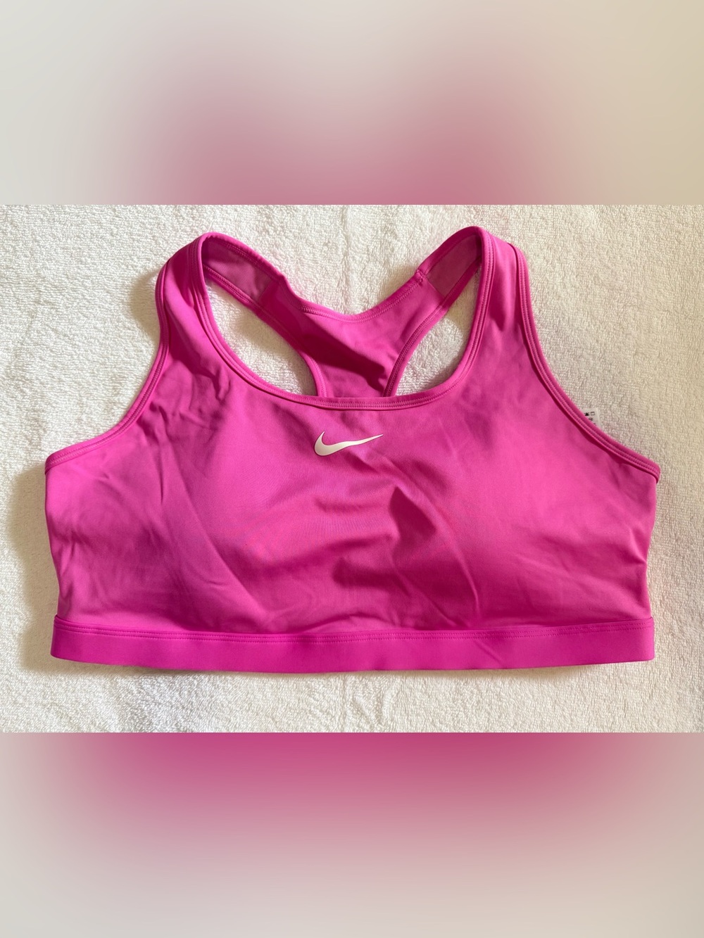 1x women’s Nike Hot Pink Racerback Sports Bra with White Swoosh